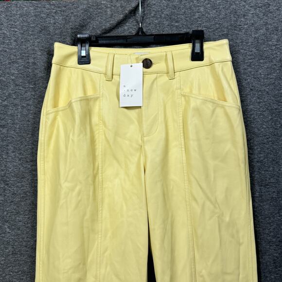 a new day Womens Faux Leather Pants Size 2 Yellow High Rise Pockets Tapered Leg - Picture 2 of 9